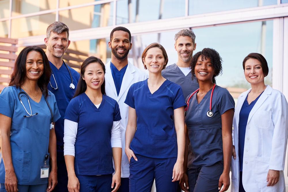 A diverse group of different health care workers.