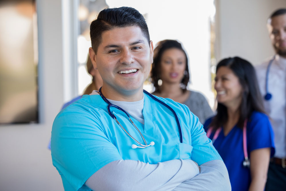 Male Hispanic health care worker.